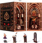 Minicity Alice's Evidence book nook showing removable miniature components including Alice, White Rabbit, card soldiers, bookshelves and decorative stands