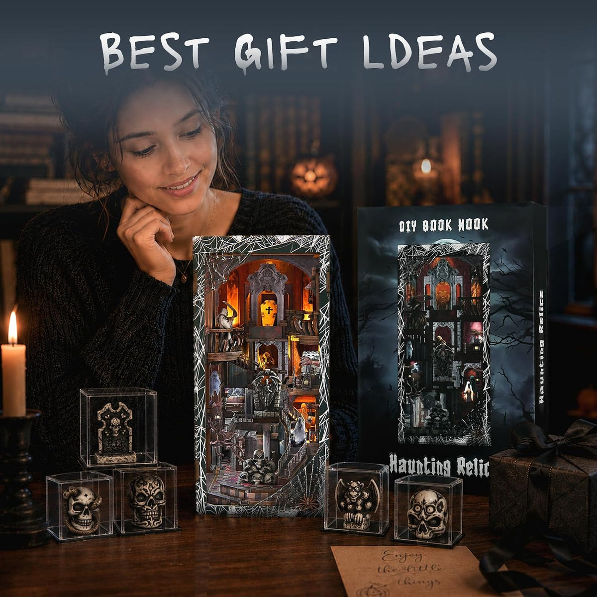 Minicity Haunting Relics DIY Book Nook Kit and illustrated gift box displayed with gothic skull ornaments for horror fans and miniature collectors