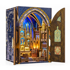 Minicity Notre-Dame Basilica DIY Book Nook Kit featuring an illuminated miniature Gothic Revival church interior with ornate arches, blue stained-glass details and golden statues