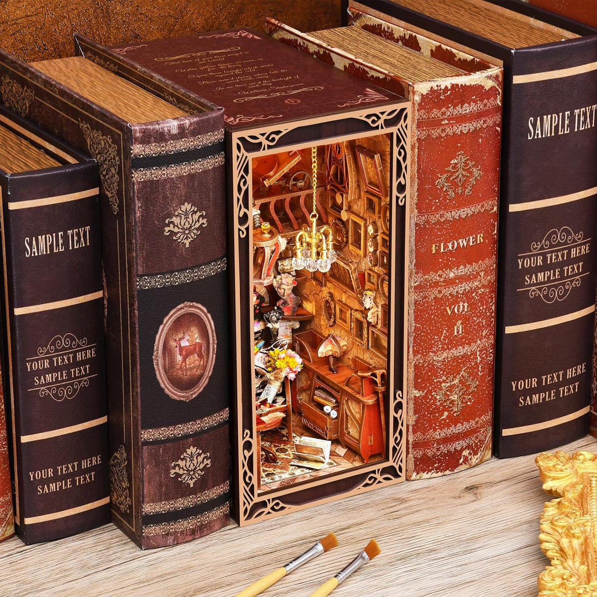 Minicity Painter's Day at Dusk DIY book nook displayed between books with detailed artist's studio interior and warm illumination