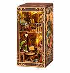 Minicity Painter's Day at Dusk DIY book nook kit with Art Nouveau painter's studio, miniature easel, artwork, furniture and warm LED lighting