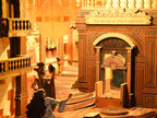 Minicity Phantom of the Opera book nook close-up featuring the ornate theatre arch, miniature opera characters, staircase and decorative stage entrance