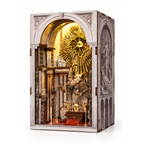 Minicity St. Charles Church DIY Book Nook Kit featuring an illuminated miniature church interior with a golden sunburst, classical sculptures and ornate architecture