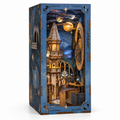 Minicity Stellar Castle DIY Book Nook Kit with a blue celestial castle, miniature observatory, planets and an astronomical clock on a white background
