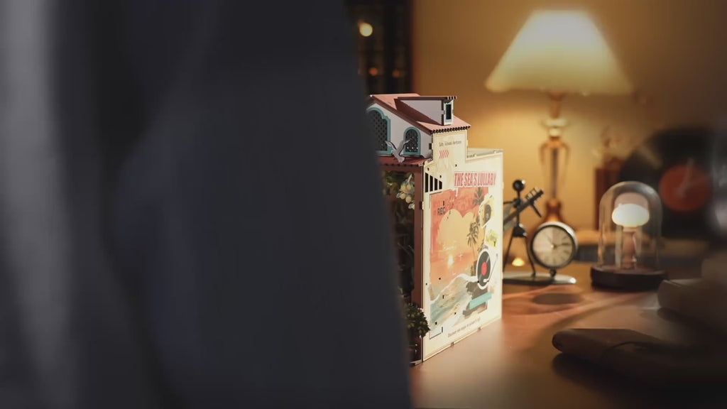 Rolife Sunset Isle DIY book nook video showing the illuminated Mediterranean miniature scene and travel-inspired side design