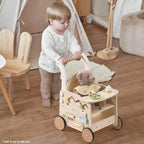 ROBUD baby push walker being used by a toddler with doll stroller functionality and interactive activity centre
