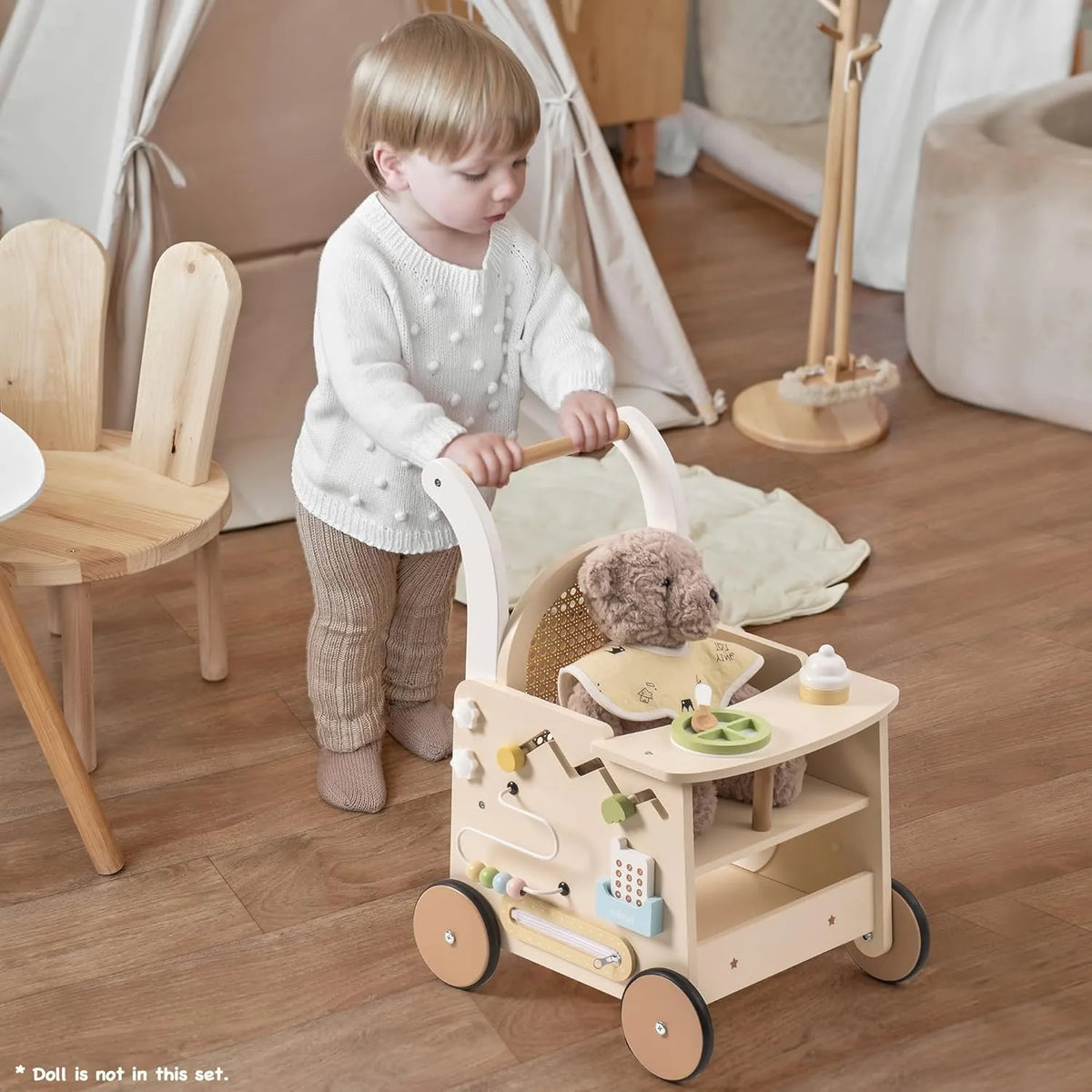 ROBUD baby push walker being used by a toddler with doll stroller functionality and interactive activity centre