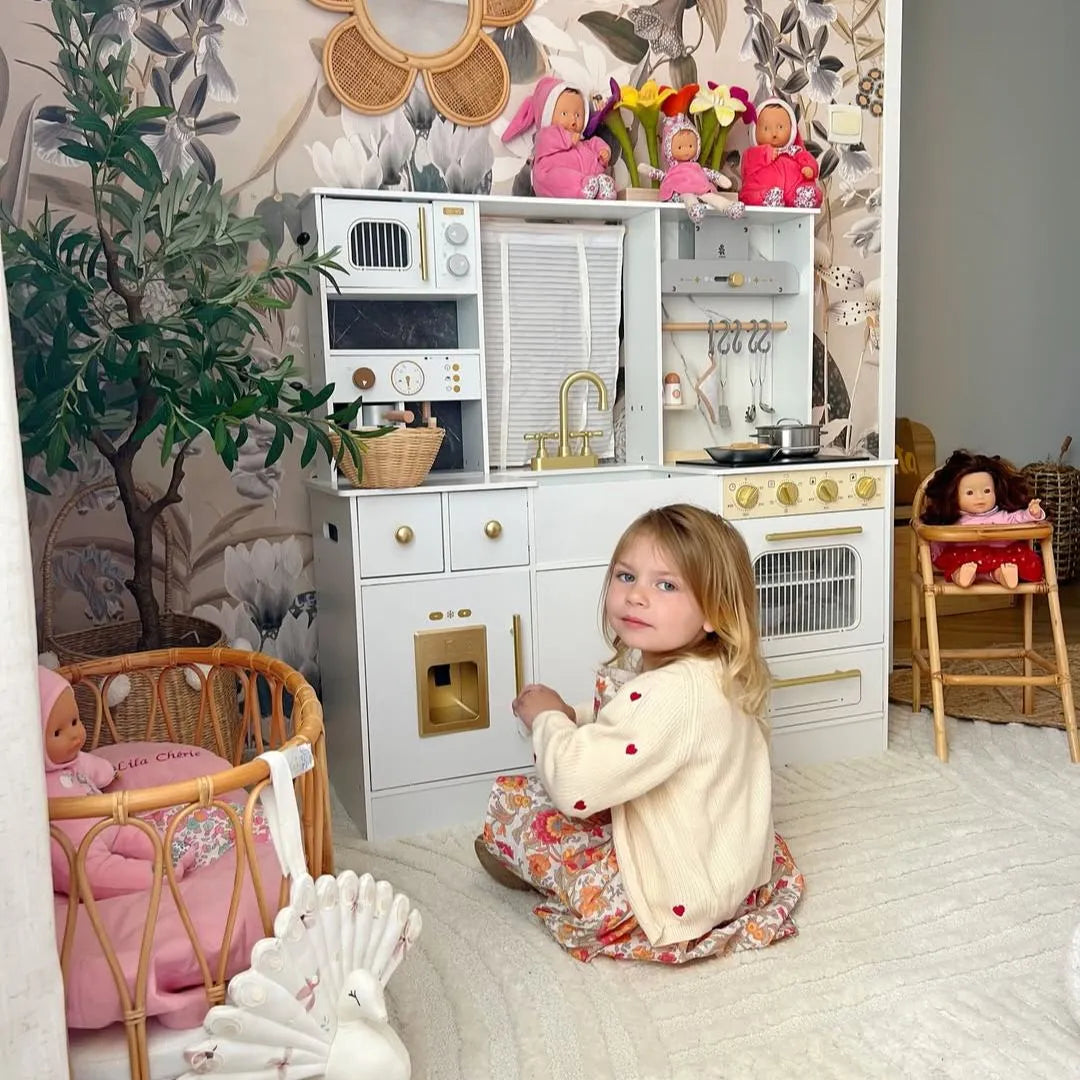 ROBUD Modern Play Kitchen for Kids displayed in a stylish playroom with a child enjoying imaginative kitchen play