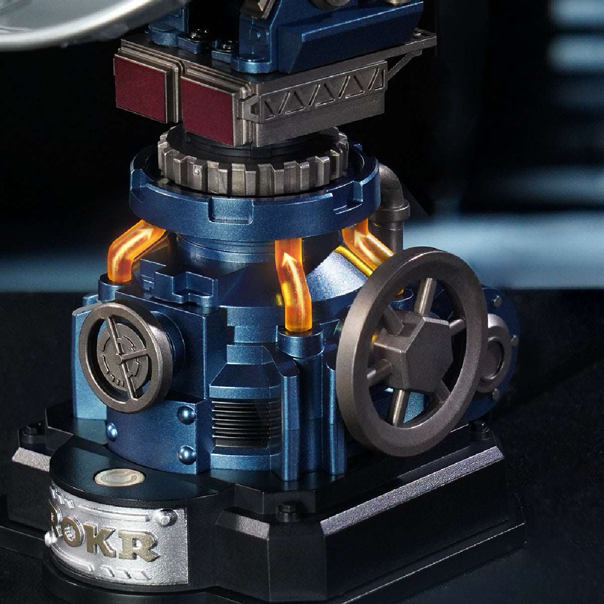 ROKR Air Radar close-up showing the metallic blue base, large side wheel, circular mechanical details and black display platform