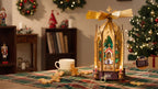 ROKR Angel's Christmas Pyramid displayed on a festive dining table, with electronic candle lights, a USB-C power connection and Christmas decorations
