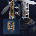 ROKR Beacon Tower mechanical model close-up featuring transparent panels, orange internal components, silver pipes and miniature industrial mechanisms