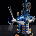 ROKR Beacon Tower close-up showing the rotating three-blade propeller, silver flywheel, exposed gears and detailed blue mechanical housing