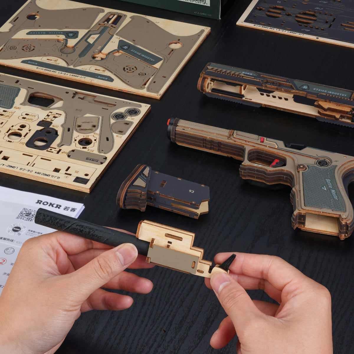 ROKR Legato C18 DIY wooden mechanical model assembly with precision-cut wooden panels, detachable components and illustrated instructions