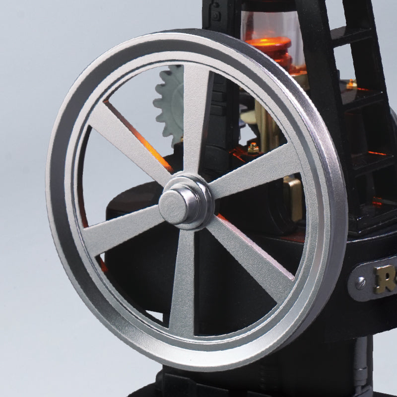 ROKR Thermo Engine large silver flywheel with six spokes, designed to rotate as part of the miniature mechanical engine