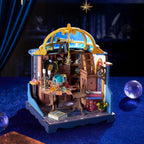 Rolife Astral Dome DIY miniature house displayed on a deep blue velvet surface with a telescope, crystal ball, tarot table and gold-framed starry dome