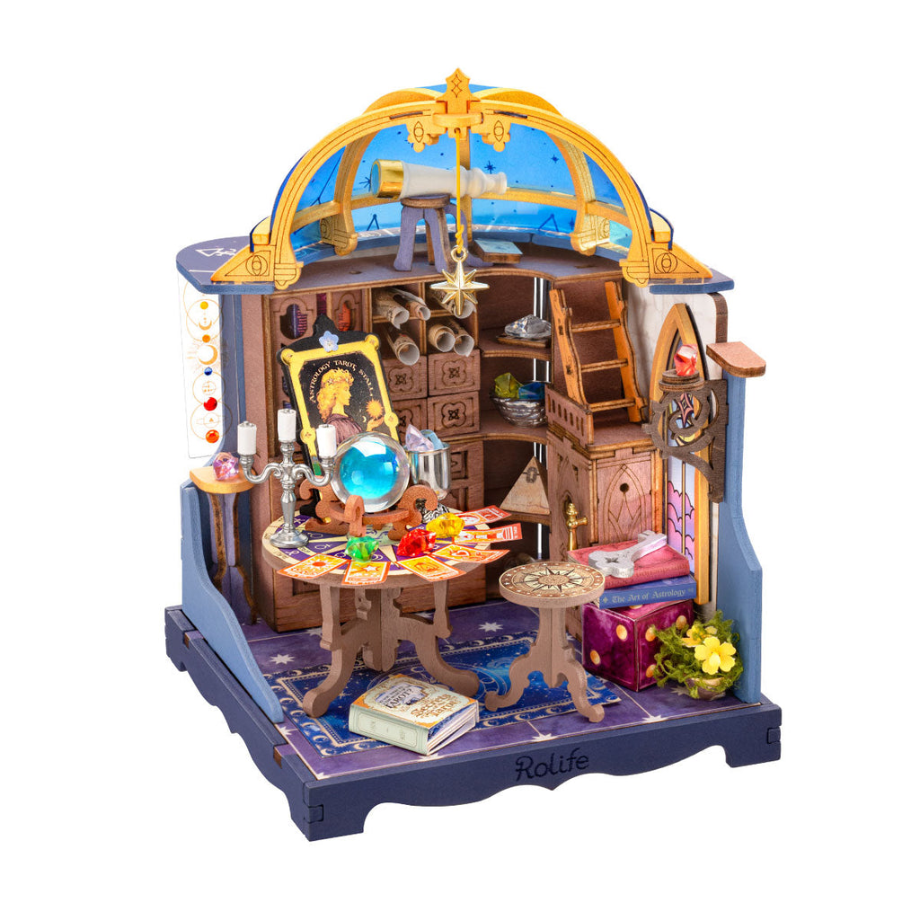 Rolife Astral Dome DS058 DIY miniature house kit featuring a celestial study with a blue observatory dome, telescope, crystal ball, tarot cards and miniature bookshelves
