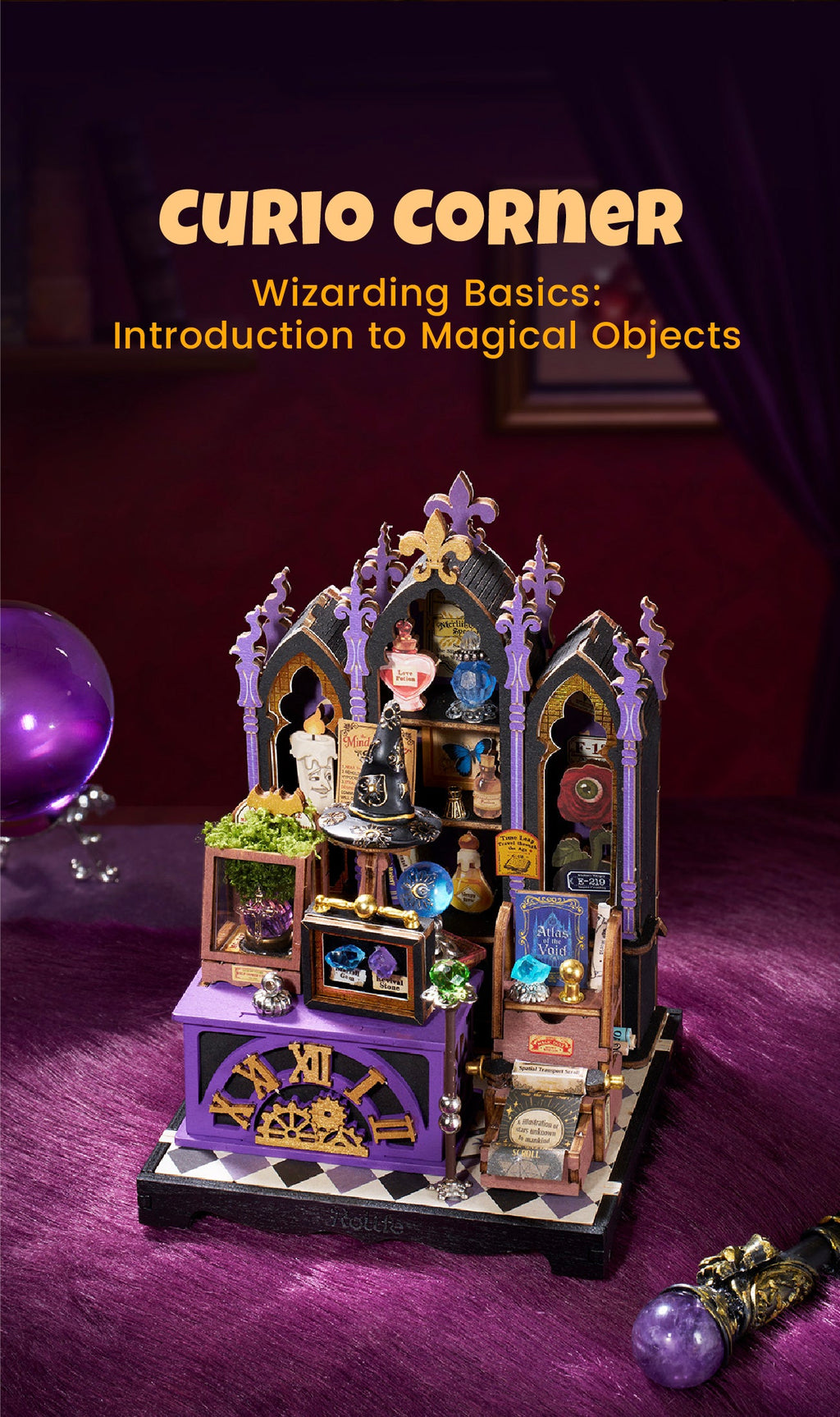 Completed Rolife Curio Corner miniature house displayed on a purple velvet surface with a crystal ball and fantasy-themed decorative accessories