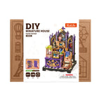 Rolife Curio Corner DS056 DIY miniature house packaging featuring the completed purple fantasy cabinet, 148 pieces and an intermediate difficulty rating