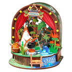 Rolife Moomintroll's Forest Camp DIY miniature house kit featuring Moomintroll and Snufkin camping beside a river with a tent, campfire and woodland details
