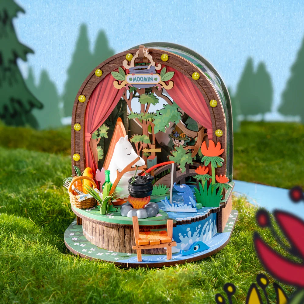 Rolife Moomintroll's Forest Camp miniature display with a red tent, forest trees, riverside scenery, campfire and colourful camping details
