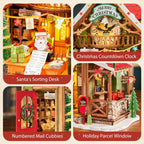 Rolife Polaris Post illuminated miniature Christmas post office displayed on a wooden table beside a snowy window and festive home decorations