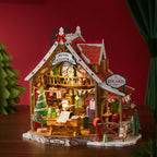 Completed Rolife Polaris Post miniature Christmas house with a glowing interior, red roof, Santa figure, Christmas tree and festive post office details