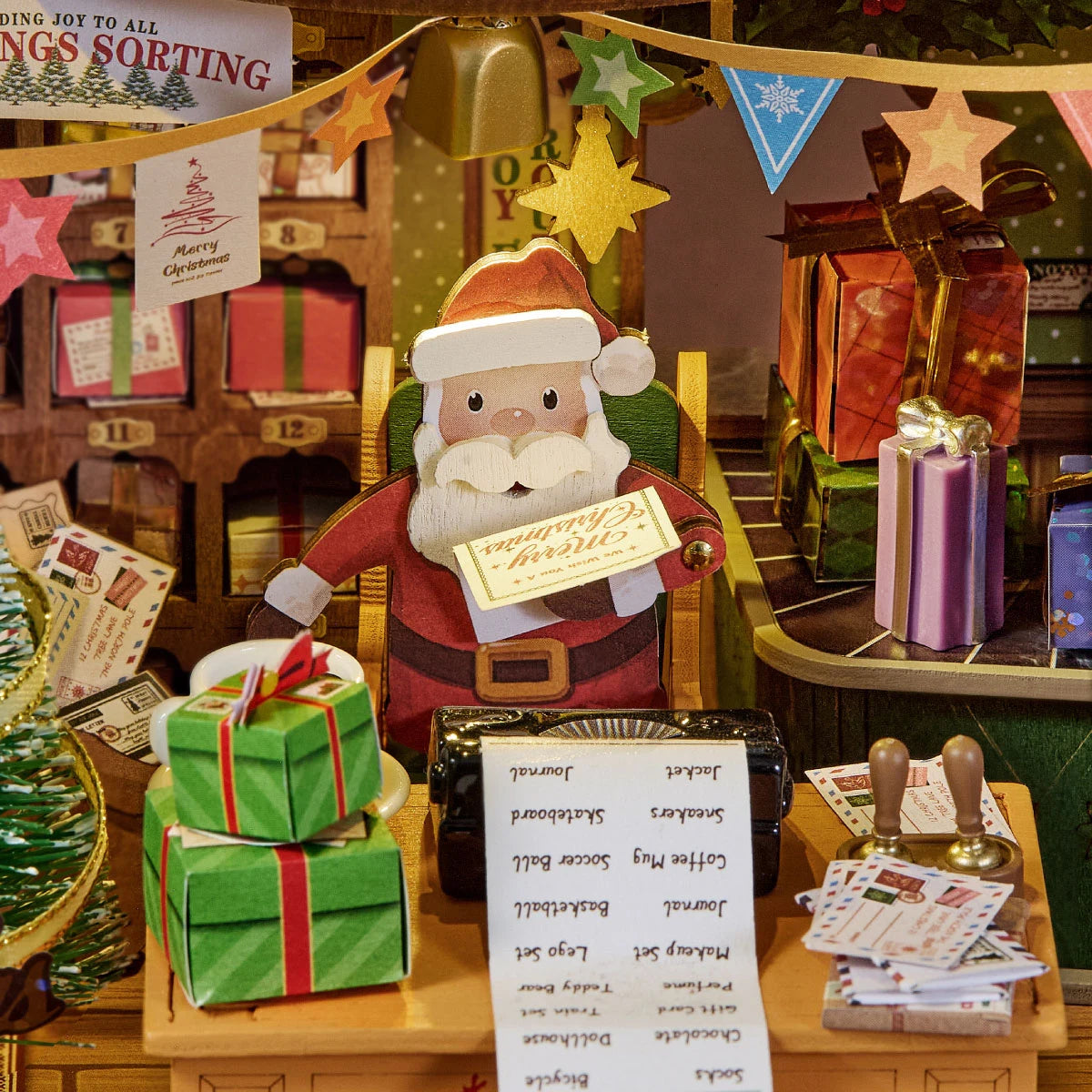 Rolife Polaris Post miniature Christmas post office with a red tiled roof, open front, Santa's desk, decorated Christmas tree and red mailbox