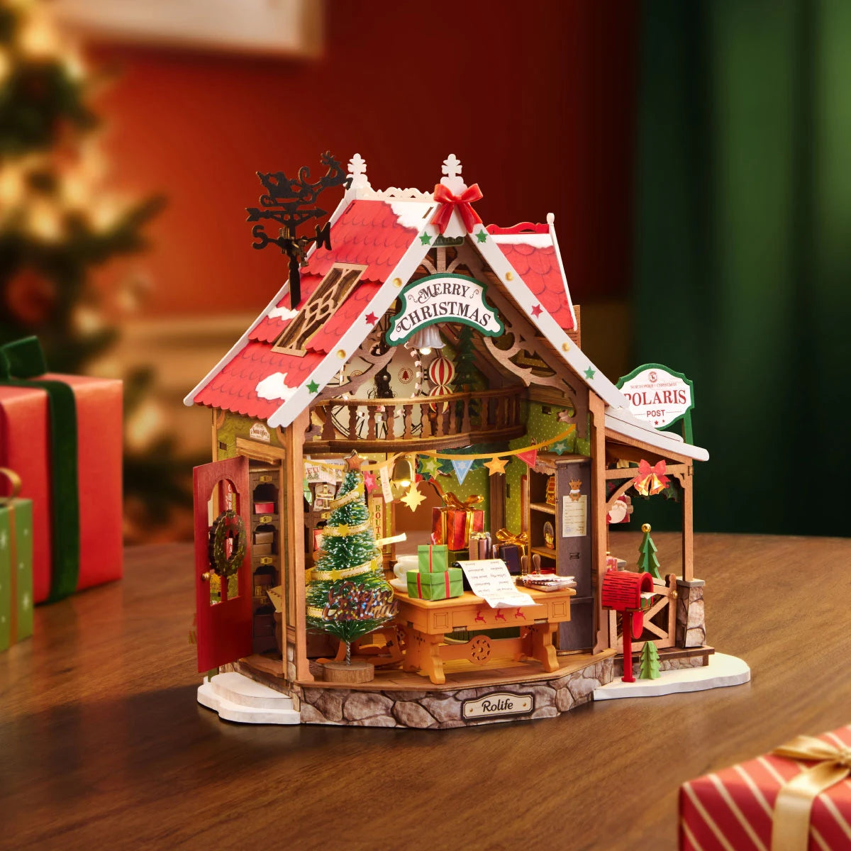Rolife Polaris Post close-up collage showing Santa's sorting desk, Christmas countdown clock, numbered mail cubbies and holiday parcel window