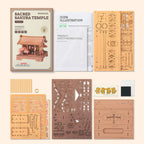 Rowood Sacred Sakura Temple TGA08 3D Wooden Puzzle Kit contents showing pre-cut wooden sheets, illustrated assembly manual, safety instructions and decorative cherry blossom pieces